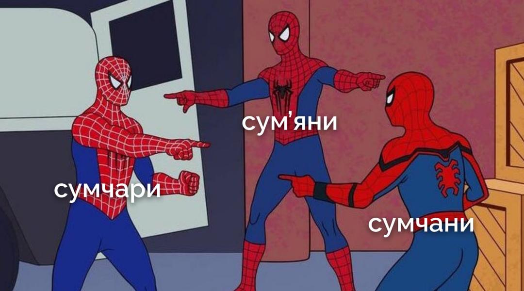 головна