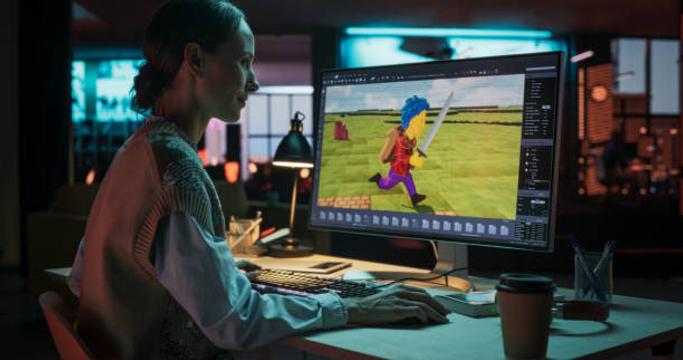 Гейм-дизайнерка розробляє новий проєкт на ноутбуці. Це чоловічок із синім волоссям, що біжить.